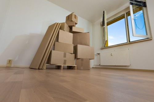 Professional removals team working in a St Johns Wood residential street