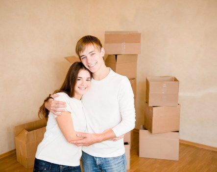 Careful handling of an upright piano in a residential London property