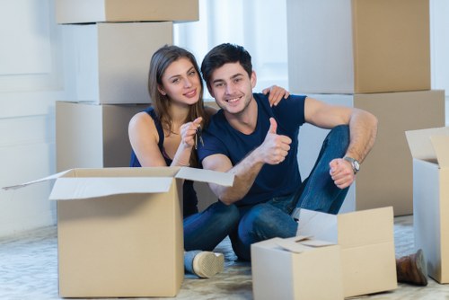 Moving team handling boxes during a house or office move